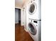 Conveniently located laundry room with modern, stacked washer and dryer at 510 Coventry Rd # 8A, Decatur, GA 30030