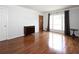 Bright living room featuring hardwood floors, gray walls, and a large window at 510 Coventry Rd # 8A, Decatur, GA 30030