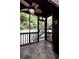 Relaxing screened porch with tiled floor, fan, and views of the wooded backyard at 510 Coventry Rd # 8A, Decatur, GA 30030