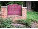 The Emory Chase Condominiums sign with brick surround and mature landscaping at 510 Coventry Rd # 8A, Decatur, GA 30030
