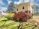 View of the backyard featuring a wooden deck and lush landscaping, ideal for outdoor enjoyment at 5221 La Paloma Sw Dr, Lilburn, GA 30047