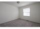 Bedroom featuring plush carpeting and windows offering natural light to create an inviting and tranquil retreat at 6136 Marbut Rd, Lithonia, GA 30058