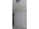 Bedroom featuring new carpet and closet space to offer comfort and functionality for modern living at 6136 Marbut Rd, Lithonia, GA 30058