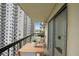 Private balcony with table and chairs, offering city views at 795 Hammond Dr # 1108, Atlanta, GA 30328