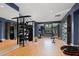 Spacious gym featuring heavy bags, climbing wall, free weights and rowing machines at 795 Hammond Dr # 1108, Atlanta, GA 30328