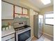 Updated kitchen with stainless steel appliances and bright natural light at 795 Hammond Dr # 1108, Atlanta, GA 30328