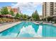Outdoor pool with lounge chairs, perfect for relaxation and recreation at 795 Hammond Dr # 1108, Atlanta, GA 30328