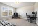 Bright bedroom features natural light, space for two desks, and neutral decor at 2320 Ridge View Dr, Loganville, GA 30052