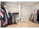 Spacious walk-in closet with wire shelving provides ample storage and organization space at 2320 Ridge View Dr, Loganville, GA 30052