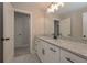 Bathroom with double doors, white shaker cabinets and a large mirror, which creates a spacious feel at 4850 Cool Springs Rd, Winston, GA 30187