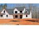 New home with gray roof and white walls, unfinished construction at 4850 Cool Springs Rd, Winston, GA 30187