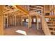 Unfinished interior framing reveals spacious layout and staircase at 4850 Cool Springs Rd, Winston, GA 30187