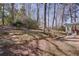 Backyard with stairs leading to a covered patio at 1497 Mason Mill Ne Rd, Atlanta, GA 30329