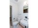 Modest bathroom featuring a toilet, sink, and a shower/tub combo at 1497 Mason Mill Ne Rd, Atlanta, GA 30329