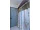 Bathroom featuring a toilet, tub/shower combo, and a privacy door at 1497 Mason Mill Ne Rd, Atlanta, GA 30329