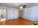 Bedroom features hardwood floors, two closets and ceiling fan at 1497 Mason Mill Ne Rd, Atlanta, GA 30329