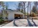 Spacious two-car garage, with an inviting carport and ample driveway parking at 1497 Mason Mill Ne Rd, Atlanta, GA 30329