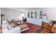 Bright living room with built-in bookshelves, large windows, hardwood floors, and a comfy sofa at 1497 Mason Mill Ne Rd, Atlanta, GA 30329