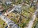 Birds eye view of a two-story home that features mature trees and landscaping at 3087 Alston Dr, Decatur, GA 30032
