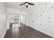Bedroom features closet with mirrored doors and light walls with tree accents at 3087 Alston Dr, Decatur, GA 30032