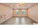 Bonus room with unique built-in storage and hardwood flooring; features two windows for natural light at 3087 Alston Dr, Decatur, GA 30032
