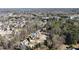 An aerial neighborhood shot showcases the community and proximity to urban area at 230 Hardscrabble Rd, Roswell, GA 30075