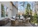 Outdoor deck with stylish furniture, a view of the yard, and a relaxing atmosphere for entertaining at 230 Hardscrabble Rd, Roswell, GA 30075