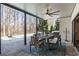 Covered patio with a ceiling fan, lounge furniture, a dining table and a view of the pool at 230 Hardscrabble Rd, Roswell, GA 30075