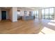 Spacious living area features hardwood floors, an open layout, and a modern kitchen with stainless steel appliances at 2425 Peachtree Ne Rd # 505, Atlanta, GA 30305
