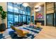 Stylish lobby with modern seating, high ceilings, and a view of the conference room at 2425 Peachtree Ne Rd # 505, Atlanta, GA 30305