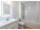 Modern bathroom featuring a lighted mirror, a single sink vanity and a shower over tub at 2479 Peachtree Ne Rd # 104, Atlanta, GA 30305