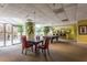 Expansive community room features a game table, billiard table, and access to a patio at 2479 Peachtree Ne Rd # 104, Atlanta, GA 30305