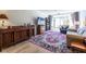 Bright living room features a sliding glass door offering views of the private outdoor space at 2479 Peachtree Ne Rd # 104, Atlanta, GA 30305