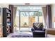 Bright living room features a sliding glass door offering views of the private outdoor space at 2479 Peachtree Ne Rd # 104, Atlanta, GA 30305