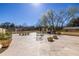 Expansive patio offering outdoor seating, barbecue grills, and verdant landscaping at 2479 Peachtree Ne Rd # 104, Atlanta, GA 30305