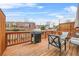 Inviting back deck with grill and comfortable seating, perfect for outdoor entertaining at 3030 Westpoint Cir, Snellville, GA 30078