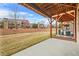 Backyard features a covered patio and lawn; ideal for relaxation and recreation at 3030 Westpoint Cir, Snellville, GA 30078