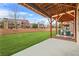 Spacious backyard features a covered patio and lush lawn, ideal for relaxation and recreation at 3030 Westpoint Cir, Snellville, GA 30078