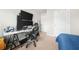 Cozy room features desk and multiple monitors at 3030 Westpoint Cir, Snellville, GA 30078