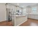 The kitchen showcases granite countertops, stainless steel appliances, and ample cabinet space at 3030 Westpoint Cir, Snellville, GA 30078