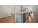 The kitchen showcases granite countertops, stainless steel appliances, and a stylish island at 3030 Westpoint Cir, Snellville, GA 30078