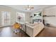 Cozy living room with hardwood floors, a fireplace, and plenty of natural light at 3030 Westpoint Cir, Snellville, GA 30078