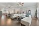 Spacious open-concept living area flows from the kitchen to dining and living spaces with hardwood floors at 3030 Westpoint Cir, Snellville, GA 30078