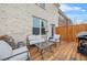 Back patio with outdoor seating and a grill. Great for entertaining at 3030 Westpoint Cir, Snellville, GA 30078