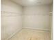 Large walk-in closet featuring white wire shelving, and generous space for storage at 305 Melanie Ct, Bowdon, GA 30108