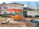 Backyard with patio, dining set, grill, and green space at 1011 Dogwood Forest Ne Dr, Marietta, GA 30068
