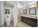 Modern bathroom with walk-in shower, double sinks, and toilet in separate room at 1011 Dogwood Forest Ne Dr, Marietta, GA 30068