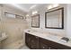 Elegant bathroom with double sinks, walk-in shower, and modern fixtures at 1011 Dogwood Forest Ne Dr, Marietta, GA 30068