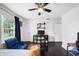 Bright bedroom with chair, fan, and lots of natural light at 1011 Dogwood Forest Ne Dr, Marietta, GA 30068
