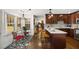 Bright kitchen features a breakfast nook, dark cabinets, and modern countertops at 1011 Dogwood Forest Ne Dr, Marietta, GA 30068